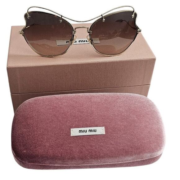 Miu Miu butterfly-style women\'s sunglasses with a pale gold-tone metal frame main image 6